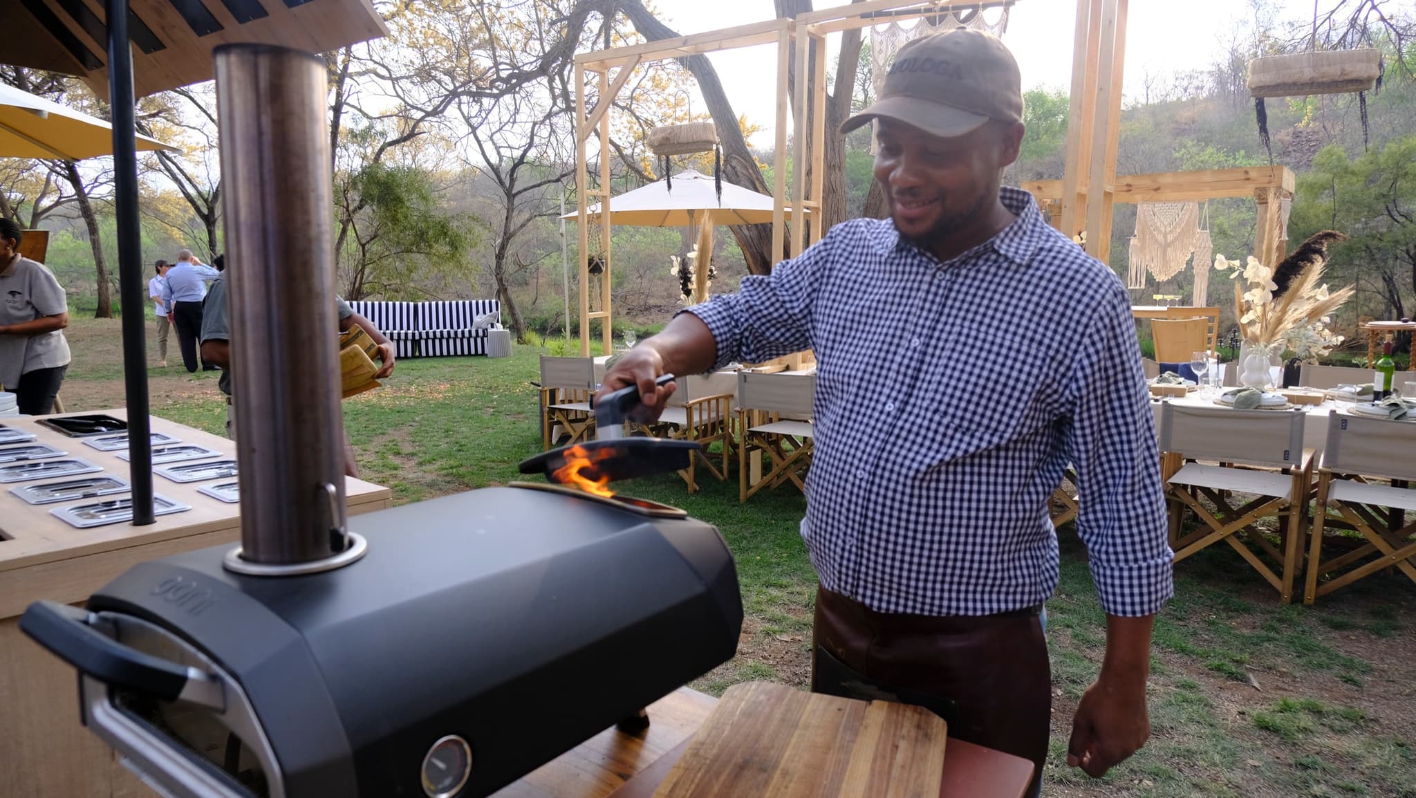 Pizza making at the outdoor wood-fired oven